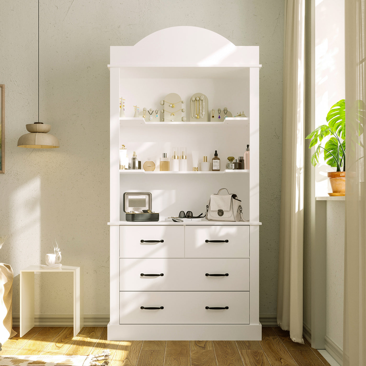 White storage cabinet with shelves and drawers in a room with a plant and lamp.