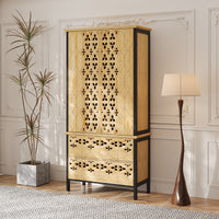 Wooden cabinet with intricate carvings in a stylish room with a plant and lamp.