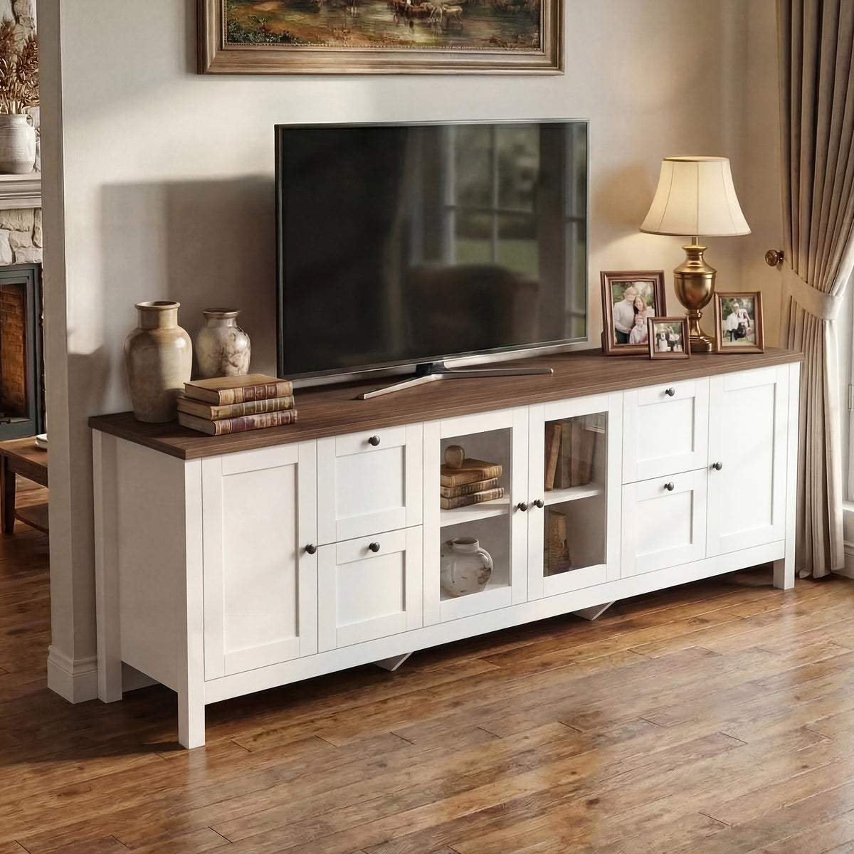 White TV stand with wood top, glass cabinet doors, drawers, and adjustable storage shelves