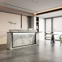 Modern reception desk with marble finish in an office setting