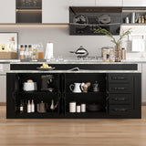 Modern kitchen with black cabinets, white countertops, and various kitchen items.