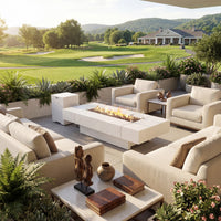 Outdoor patio with fire pit, furniture, and scenic golf course view