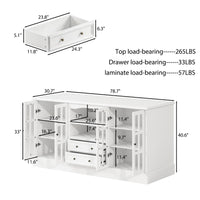 White kitchen island with glass cabinet doors, open shelves, and center drawers
