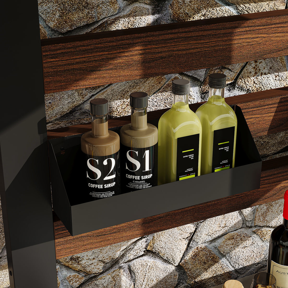 Four bottles of S1 coffee syrup on a shelf with a stone wall background