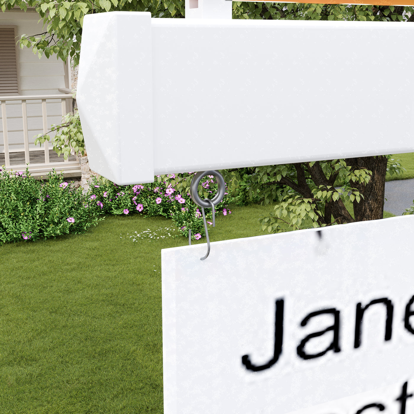 White sign with 'Jane' text attached to a garden with green grass and flowers