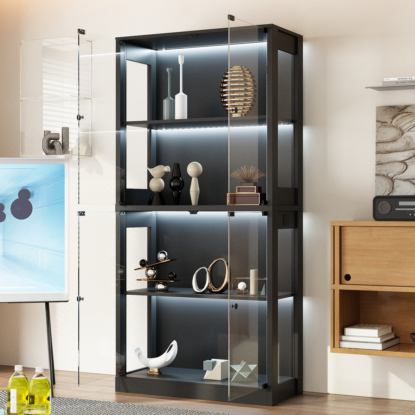 Modern black glass display cabinet with decorative items in a room setting.