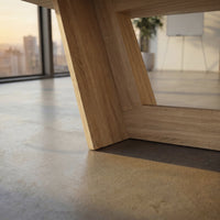 Wood dining table with V-shaped pedestal base 