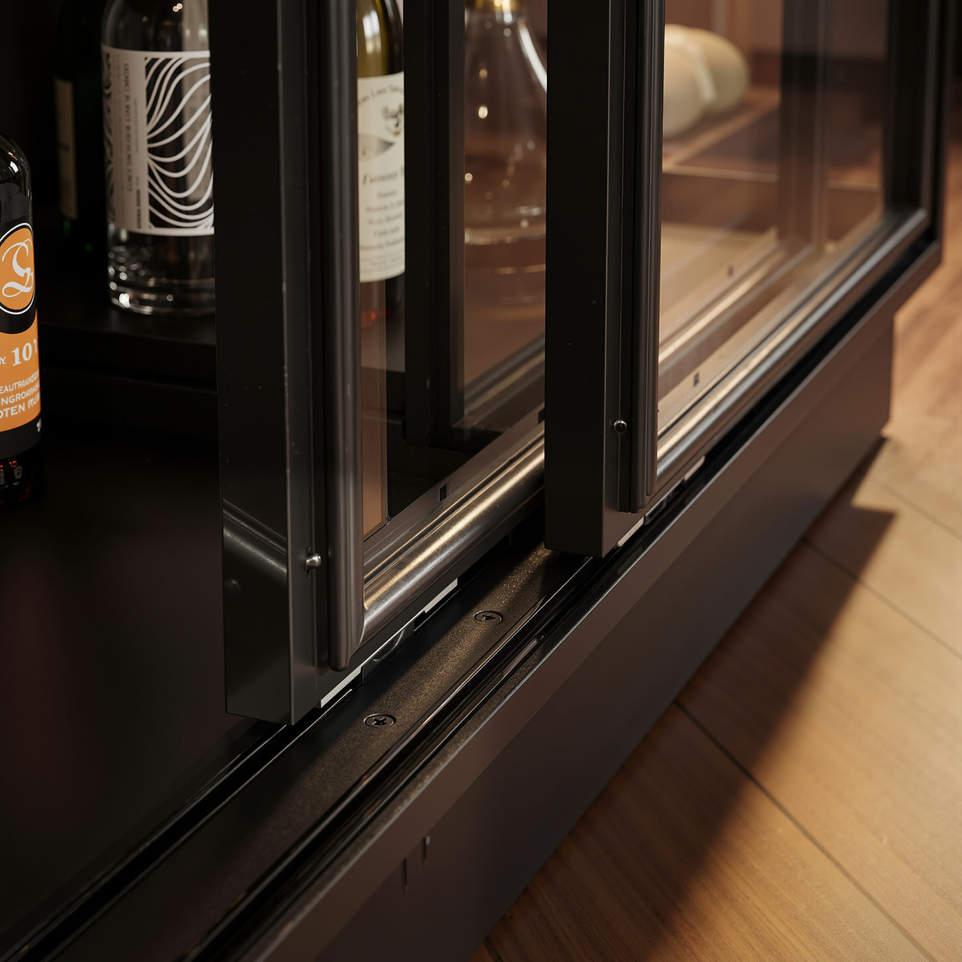 Black display cabinet with glass doors and LED lighting