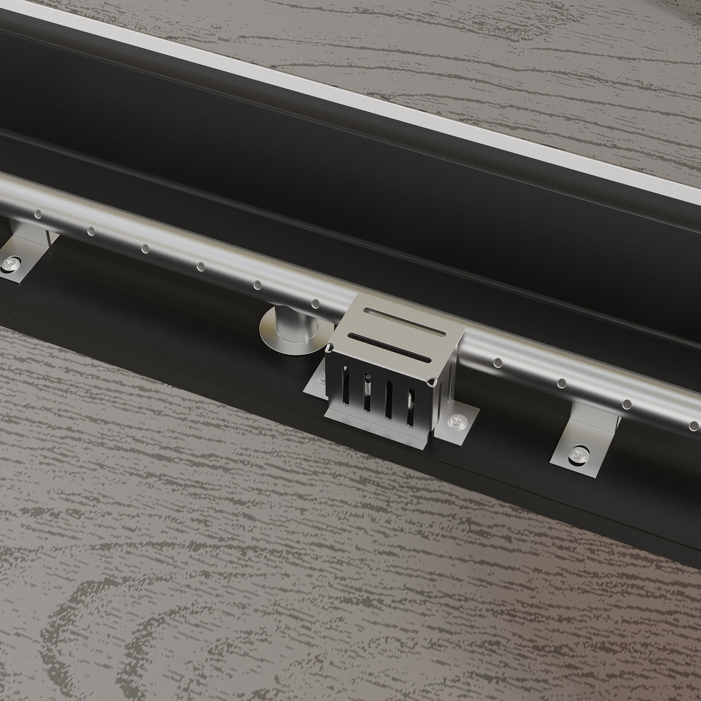 Metal track lighting fixture on a wooden surface