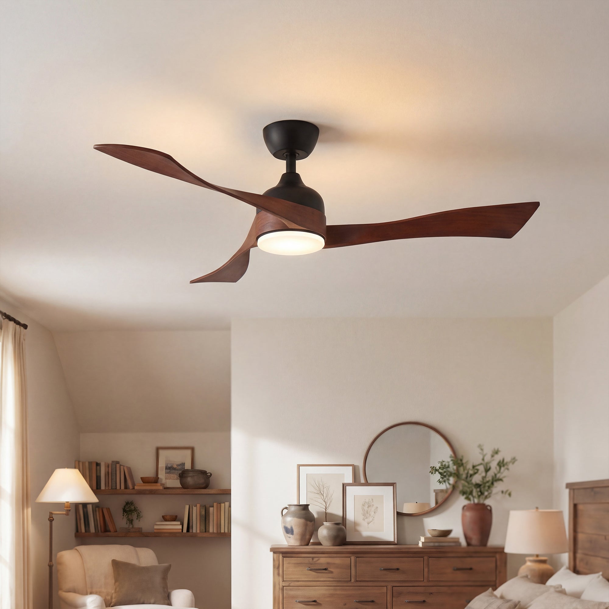Ceiling fan in a bedroom with wooden furniture and decor