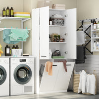 Laundry room with washing machine, dryer, and storage cabinets.