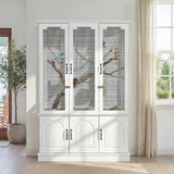 White cabinet with glass doors in a room with a plant and window.