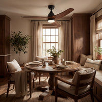 Cozy living room with wooden table, chairs, and decorative elements.