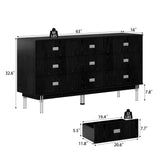Modern black dresser with silver handles and metal legs
