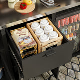 Open kitchen drawer with food items including a bag of flour, containers, and bottles.