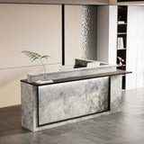Modern reception desk with marble finish in an office setting