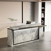Modern reception desk with marble finish in an office setting