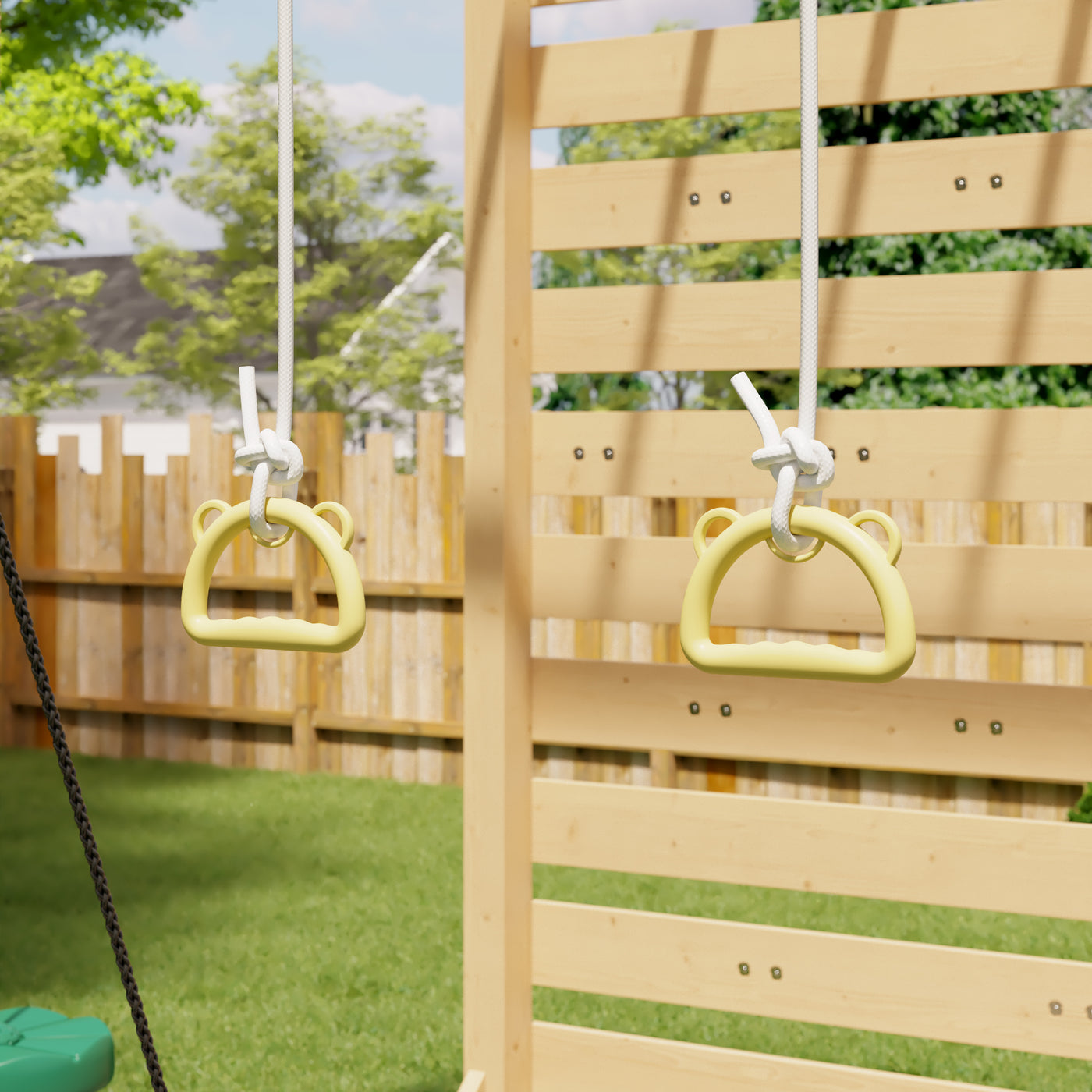 Wooden play structure with yellow monkey bars in a backyard setting