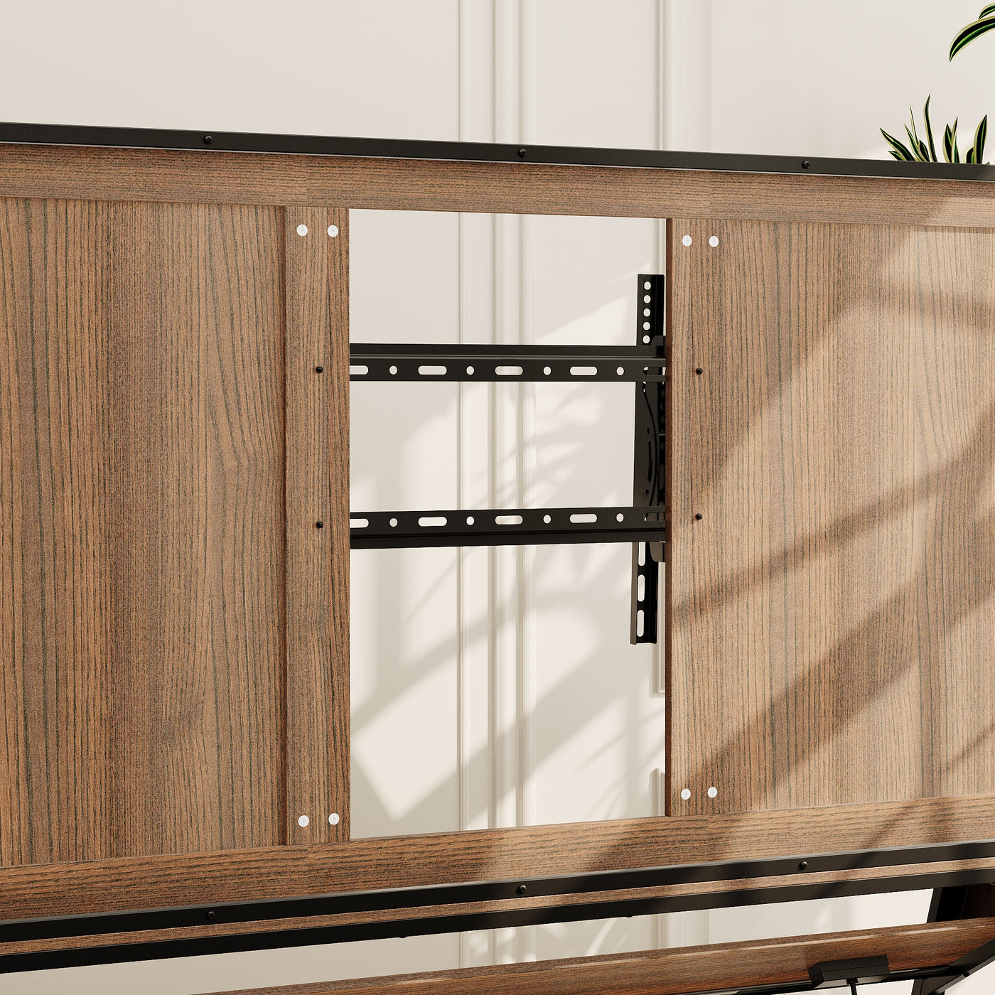 Brown TV stand with open shelves, black metal frame, and caster wheels