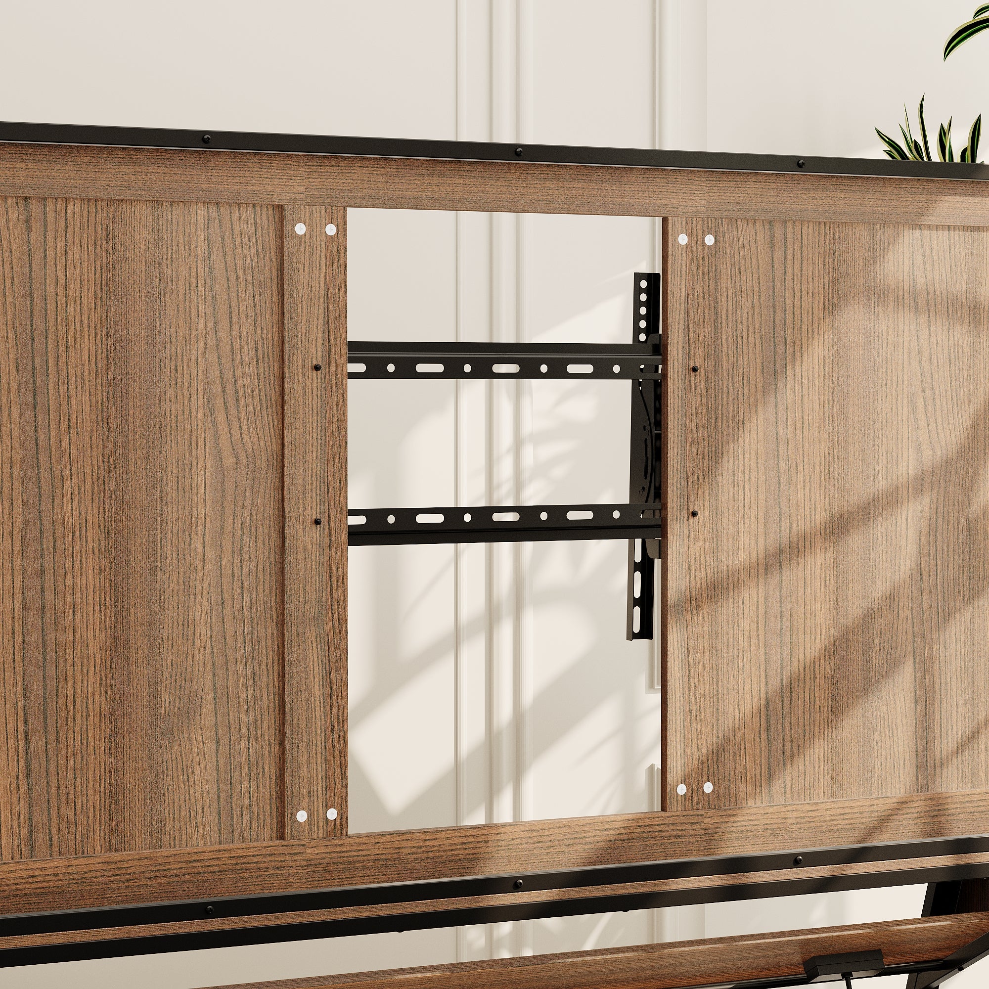 Brown TV stand with open shelves, black metal frame, and caster wheels