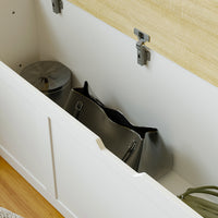 White corner shoe cabinet with bench seating and hidden storage