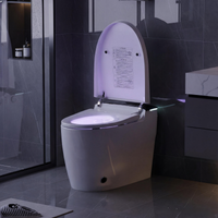 White smart toilet with closed lid, digital display, and built-in bidet