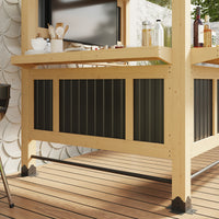 Wooden outdoor bar with black metal accents on a wooden deck
