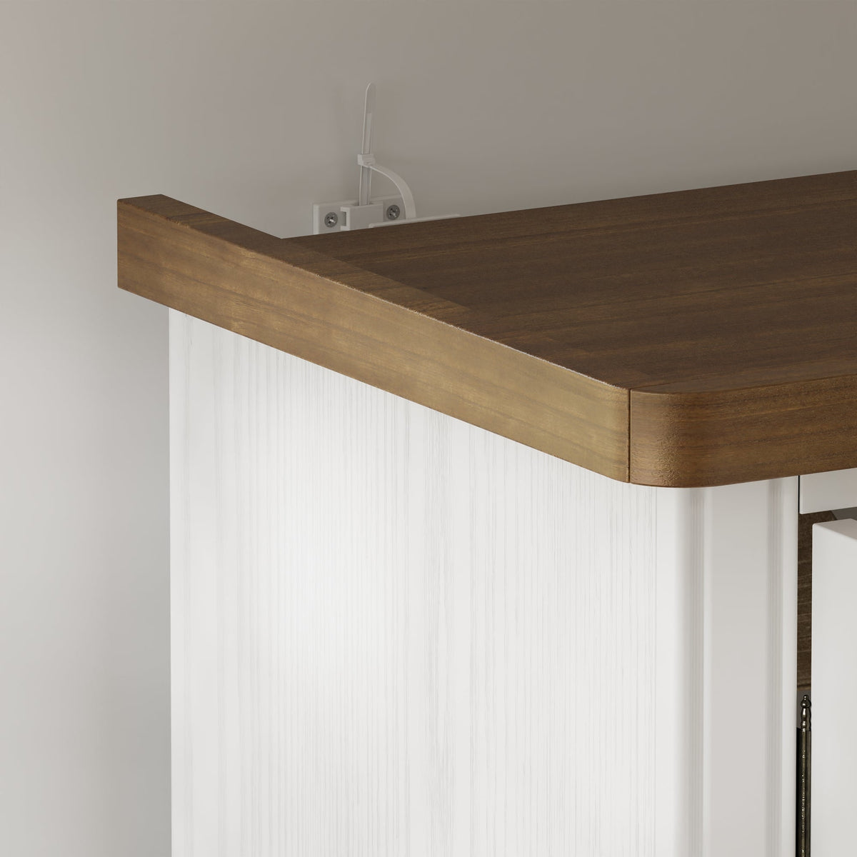 Dining room with a white ornate cabinet and wooden table