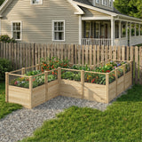 Wooden raised garden bed with plants in front of a house