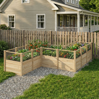 Wooden raised garden bed with plants in front of a house