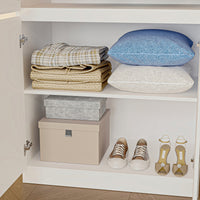 White armoire with mirrored doors and cabinet storage