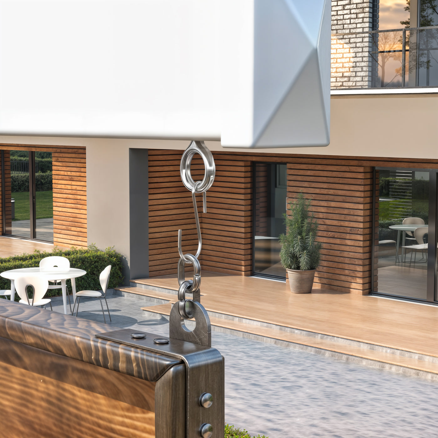 Modern house exterior with wooden facade and outdoor furniture