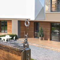 Modern house exterior with wooden facade and outdoor furniture