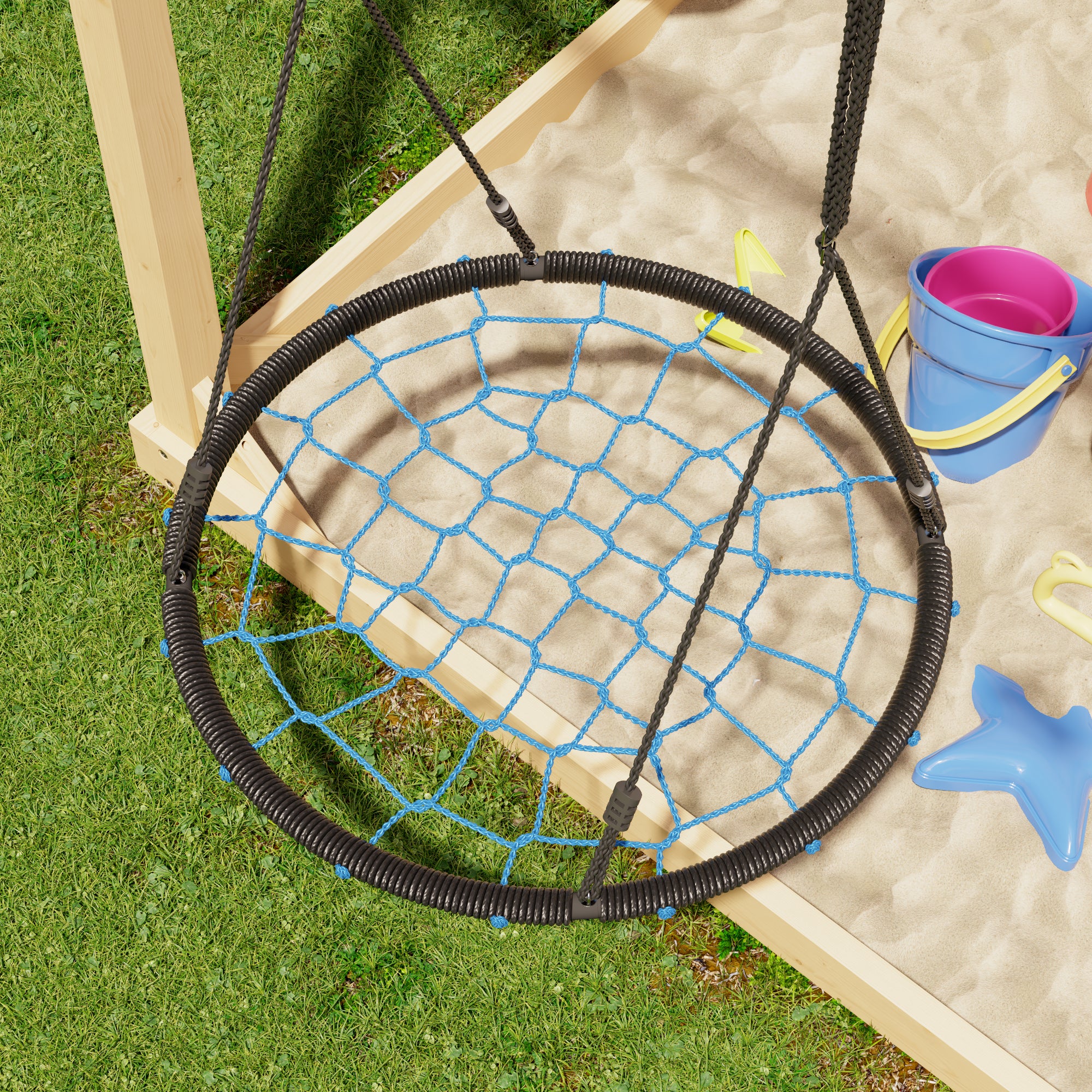 Children's swing with netting over a sandbox on grass