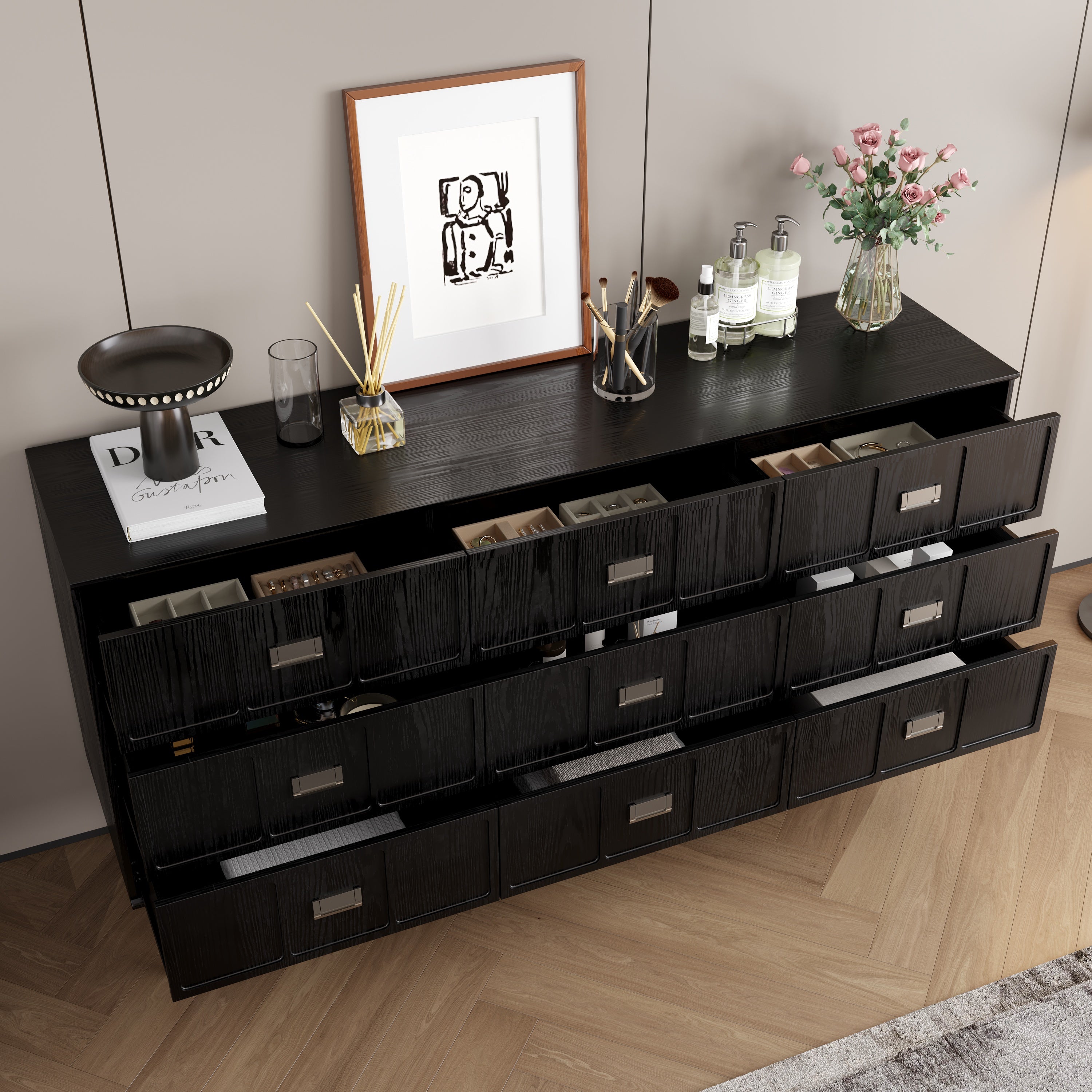 Modern black dresser with silver handles and metal legs