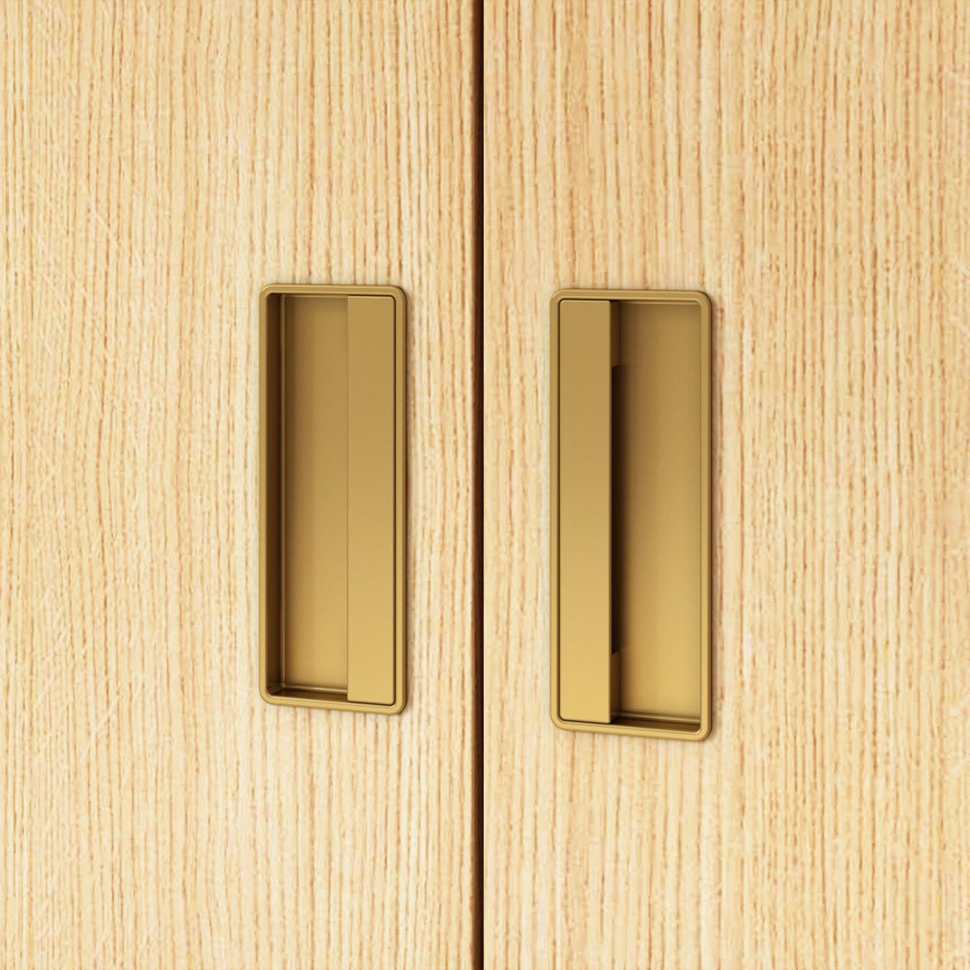 Close-up of wooden cabinet doors with gold handles