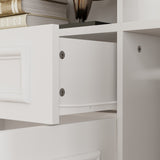 White bookcase set with glass doors, lower cabinets, and center open shelves