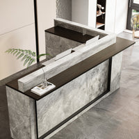 Modern reception desk with marble finish in an office setting