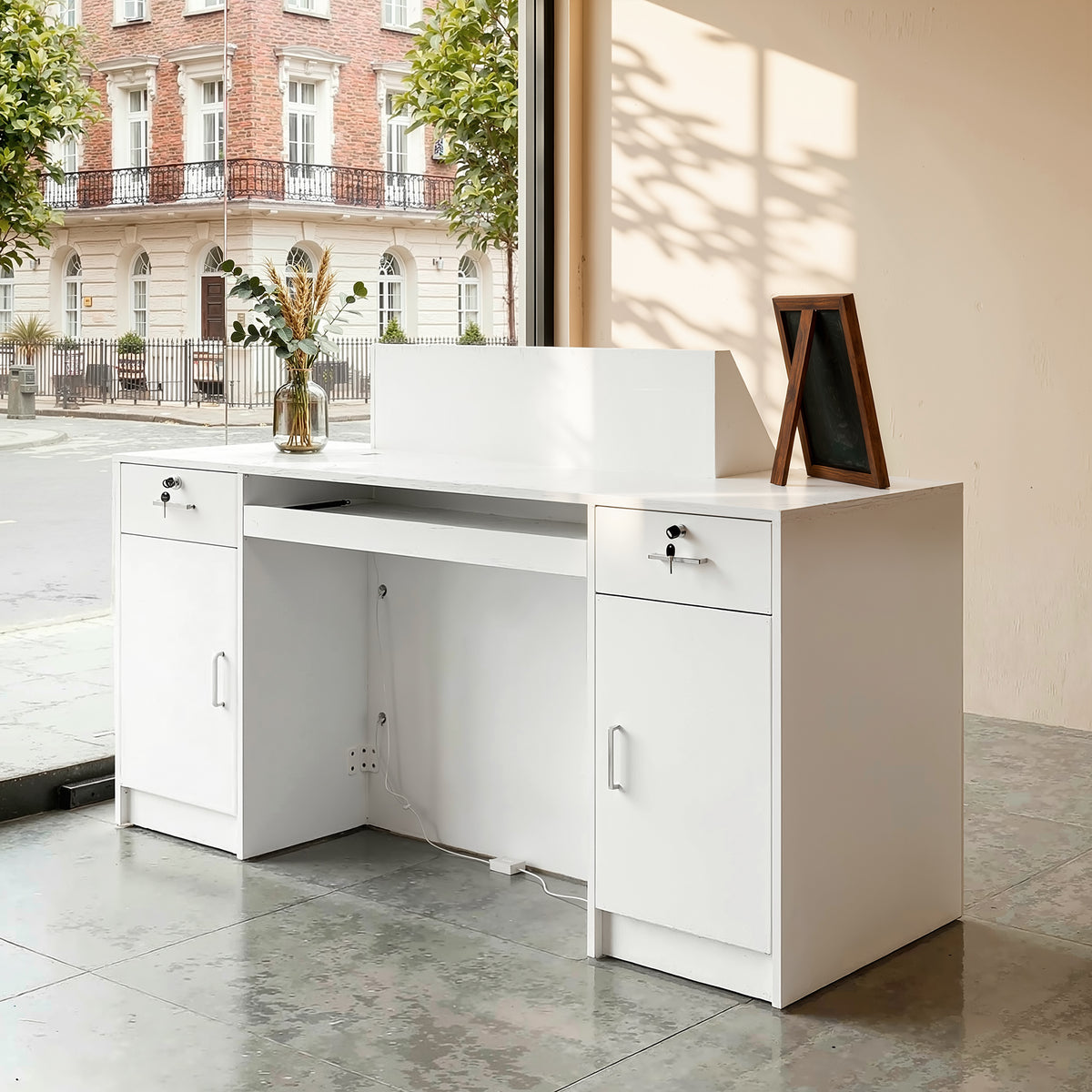 White reception desk with open display shelves and built-in LED lighting