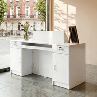 White reception desk with open display shelves and built-in LED lighting