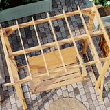 Wooden swing on a stone patio