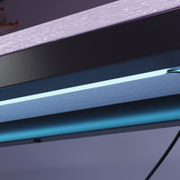 55" Ergonomic Black Gaming Desk with LED Lights & Charging Station