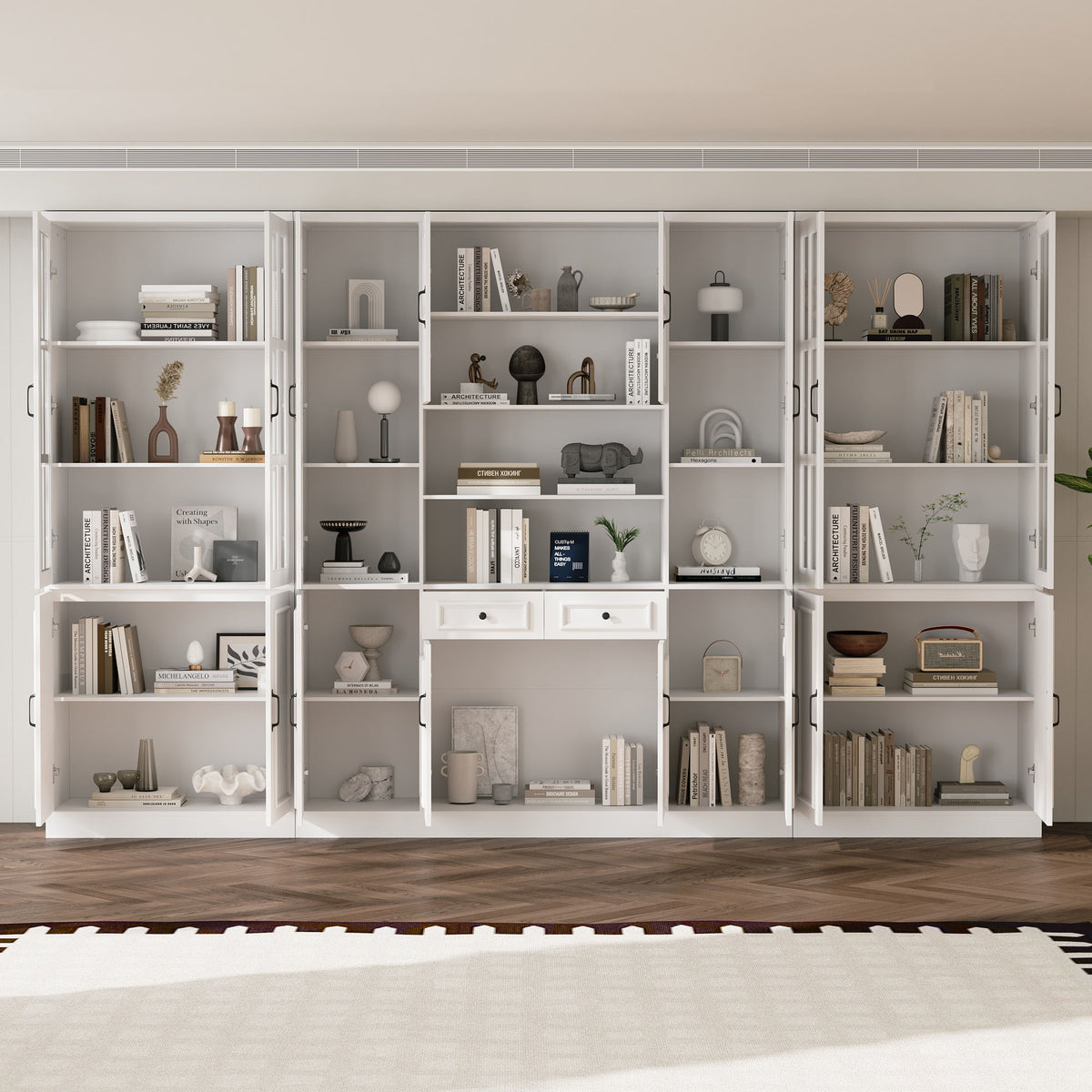 White bookcase set with glass doors, lower cabinets, and center open shelves