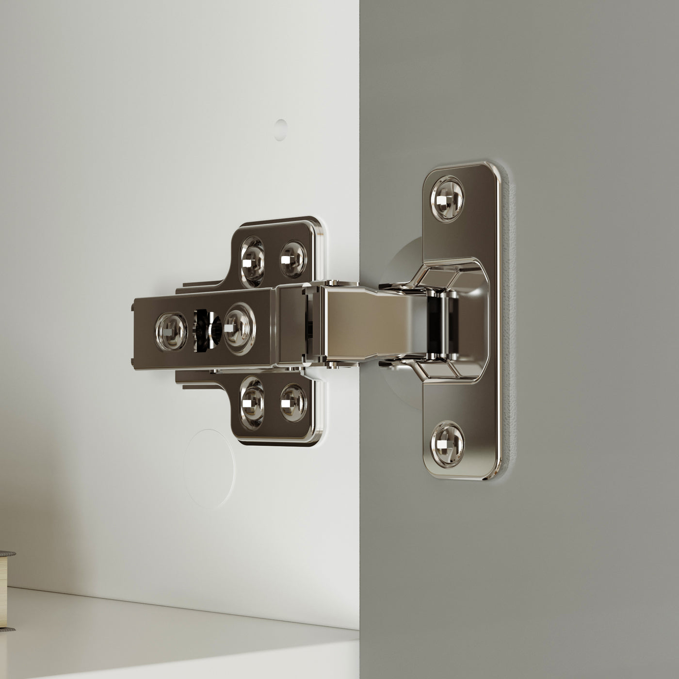 Metallic door hinge on a gray background