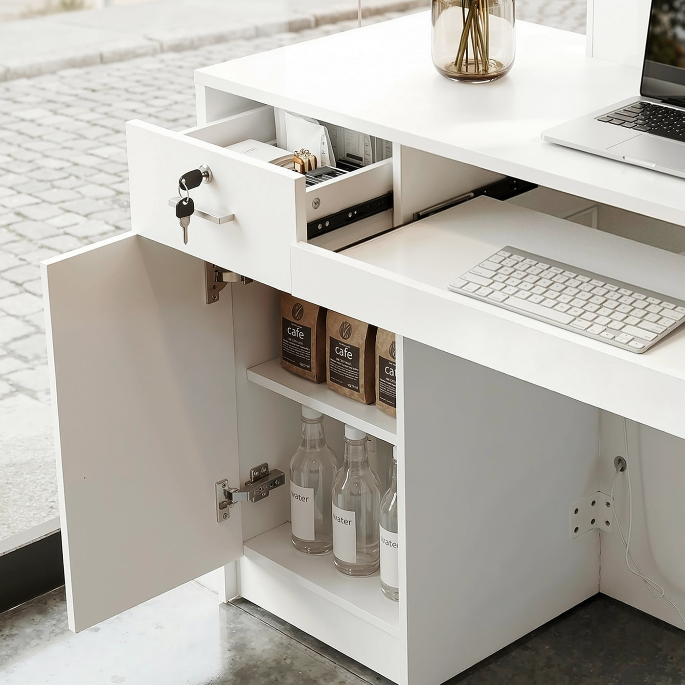 White reception desk with open display shelves and built-in LED lighting