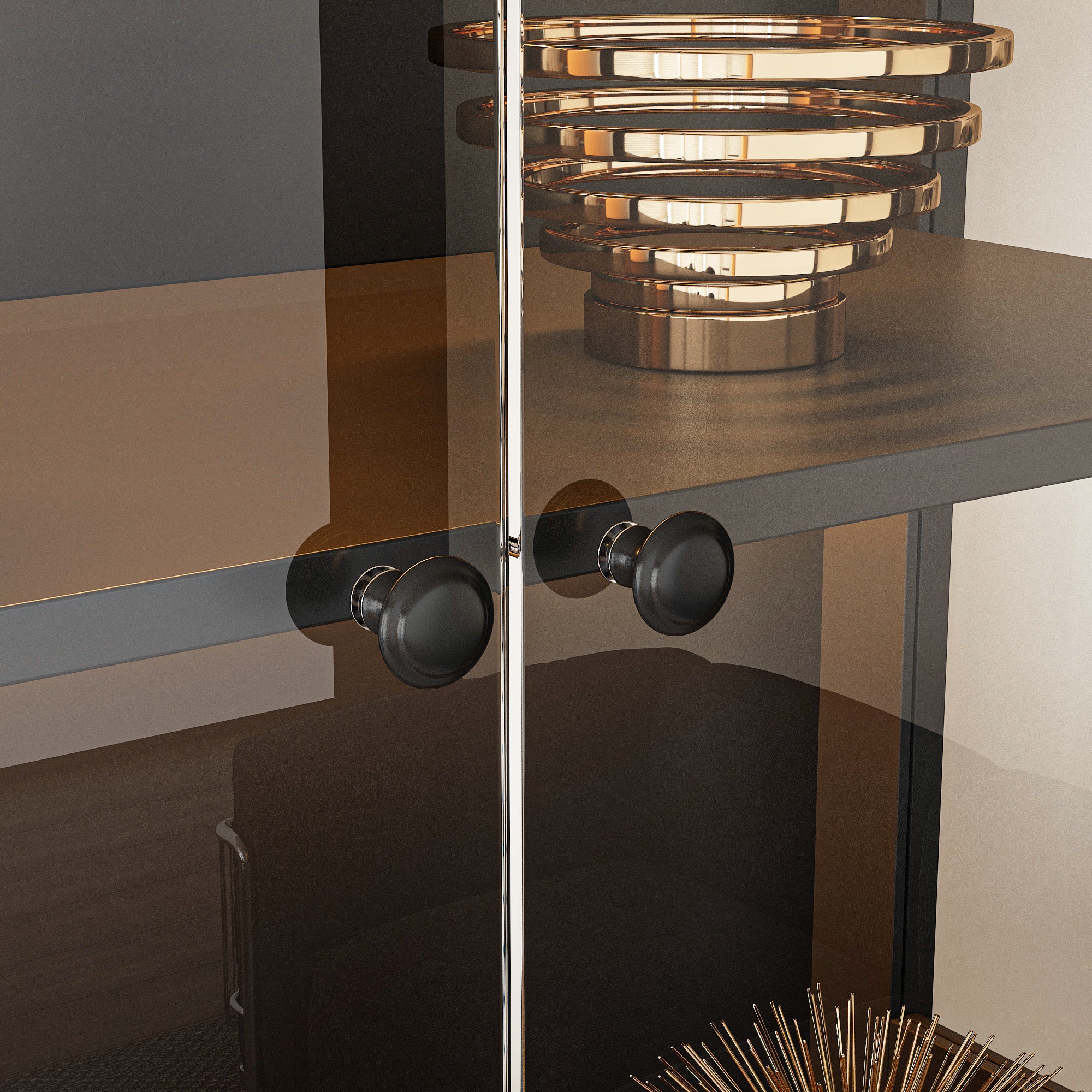 Modern interior design with a glass cabinet, black handles, and a decorative lamp.