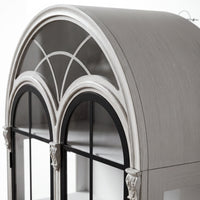 Arched display cabinet with glass doors and drawers