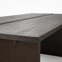 Brown wood writing desk with cable management
