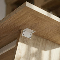 Wood dining table with V-shaped pedestal base 