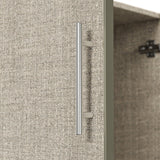 Beige armoire with pants rack and hanging rod